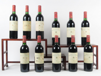 Vente aux enchères 11 BOUTEILLES CHÂTEAU L'ARROSEE GCC ST EMILION - 1987 - 7 BG/4 LB/EF