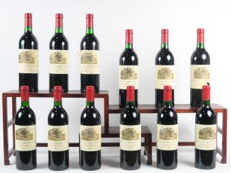 Vente aux enchères 12 BOUTEILLES CHÂTEAU MAGDELAINE 1er GCC ST EMILION - 1987 - CBO - BG