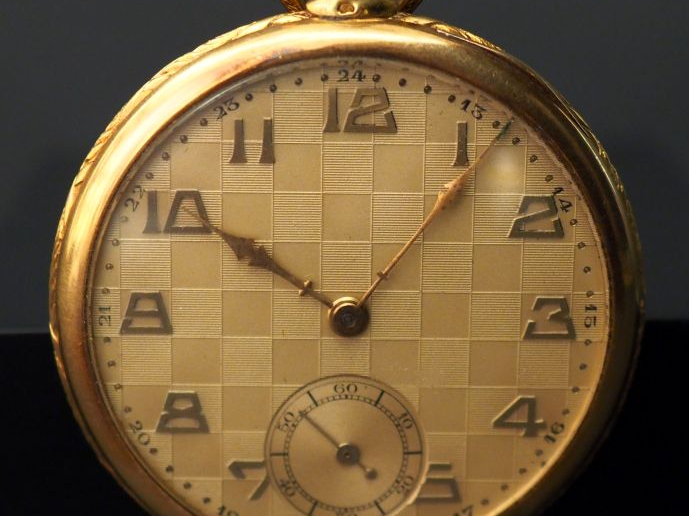 Montre de gousset en or jaune. Cadran à chiffres arabes pour les heure