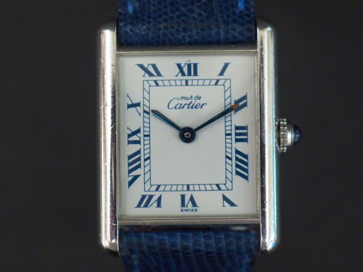 CARTIER, Must Montre bracelet tank de dame, en argent.  Cadran rectang