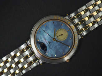 Vente aux enchères Maurice LACROIX, Moonphase. Montre bracelet en métal et métal doré. Ca