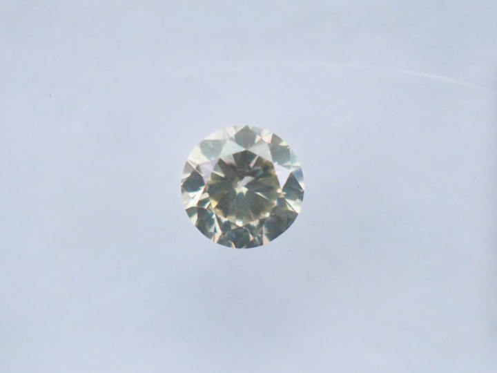	Diamant sur papier « Greyish yellow » de 0,33 ct-SI2.  Avec son certi
