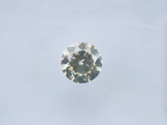 Vente aux enchères 	Diamant sur papier « Greyish yellow » de 0,33 ct-SI2.  Avec son certi