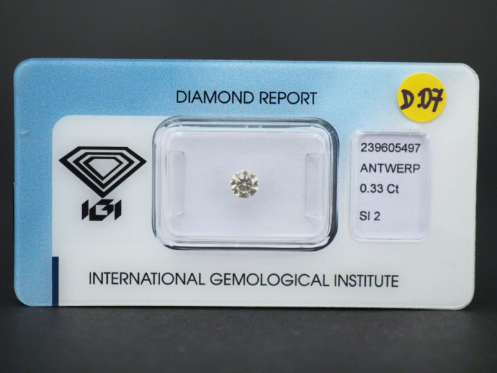 	Diamant sur papier « Greyish yellow » de 0,33 ct-SI2.  Avec son certi