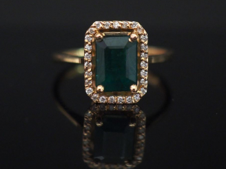 Vente aux enchères Bague de style Art déco en or rose 14k, sertie en son centre d’une éme