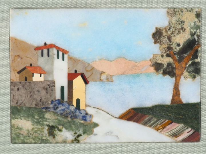 SCARPELLI. Plaque en marqueterie de marbre, "vue de village en bord de