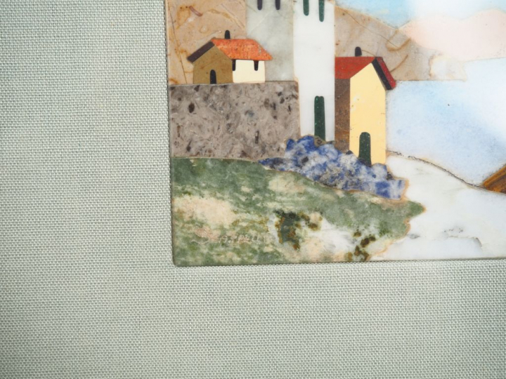 SCARPELLI. Plaque en marqueterie de marbre, "vue de village en bord de
