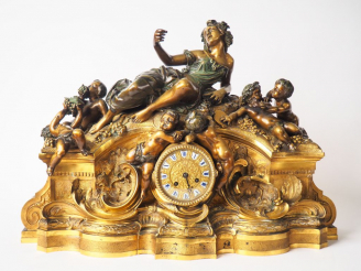 Vente aux enchères Grande pendule de cheminée Napoléon III en bronze à double patine figu