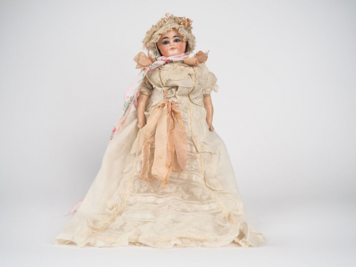 Bébé de caractère double face de marque Carl Bergner, tête porcelaine 