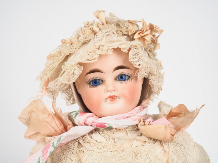 Bébé de caractère double face de marque Carl Bergner, tête porcelaine 