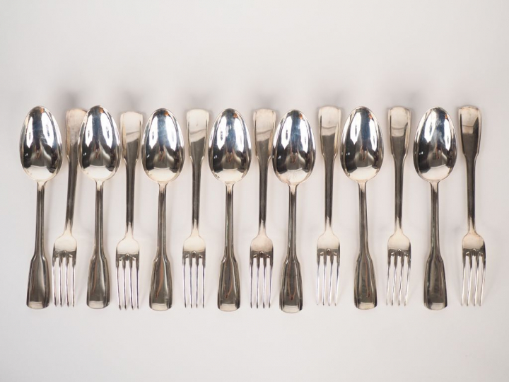 Suite de sept couverts de style Art déco en argent 835/1000. M.O : Wol