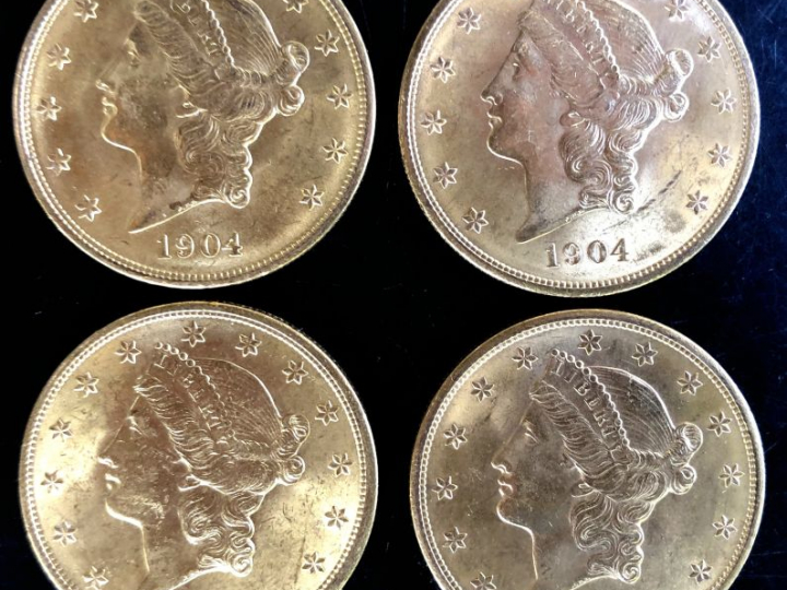 Quatre pièces de 20 Dollars or, 1904. FRAIS ACHETEURS 5% TTC.