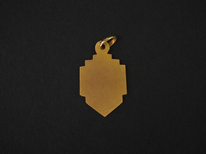 Médaille religieuse de style Art déco en or jaune, figurant la Sainte 