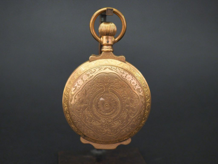 JAMES POOLE, LIVERPOOL Montre de gousset aveugle en plaqué or, à décor