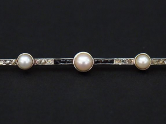 Vente aux enchères Broche barrette de style Art déco en or jaune, sertie de cinq demi per
