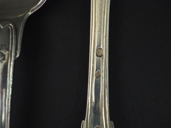 Ensemble comprenant :  - deux grands couverts Restauration en argent, 