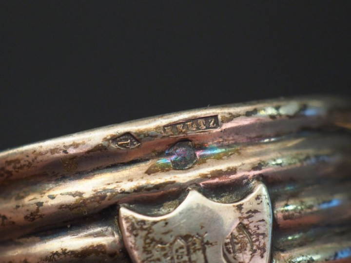 Ensemble comprenant :  - un rond de serviette en argent, poinçon Miner