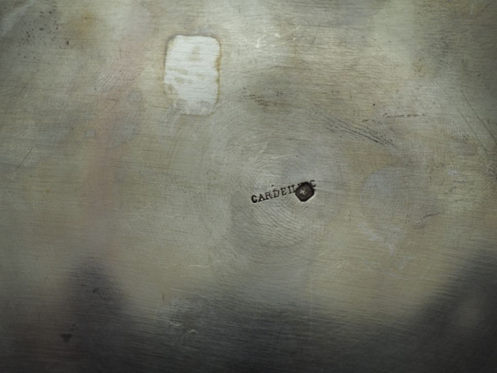 Ensemble comprenant :  - une assiette à bouilli en argent, poinçon Min