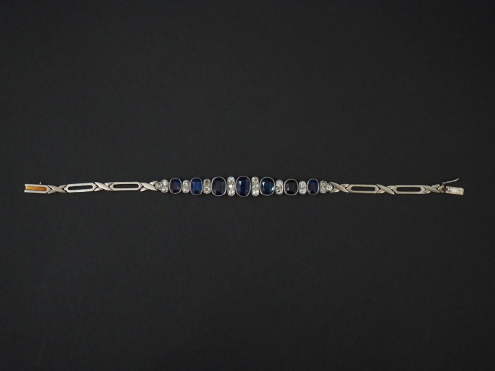 Bracelet articulé de style Art déco en or jaune et blanc, composé de s
