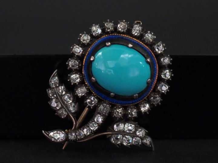 Broche en argent et vermeil en forme de fleur, sertie en son centre d'