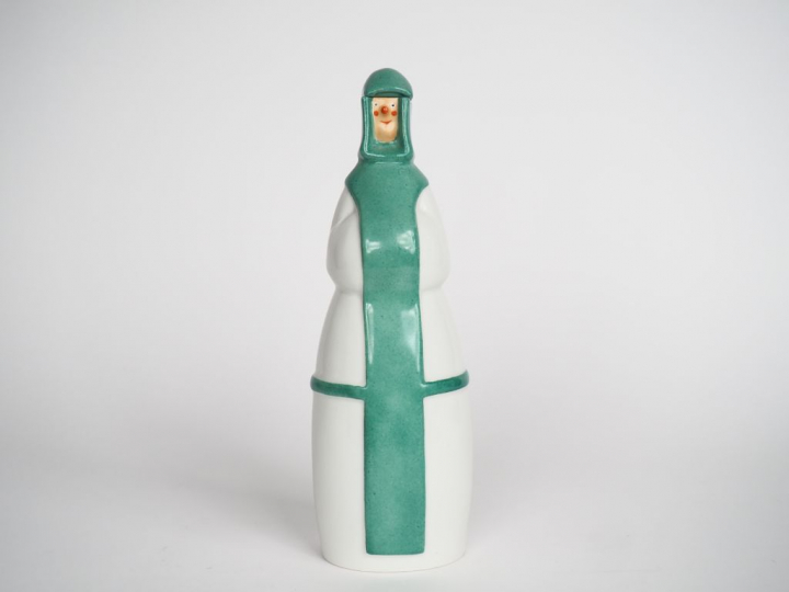 ROBJ.  Bouteille à liqueur en porcelaine polychrome "religieuse" Signé