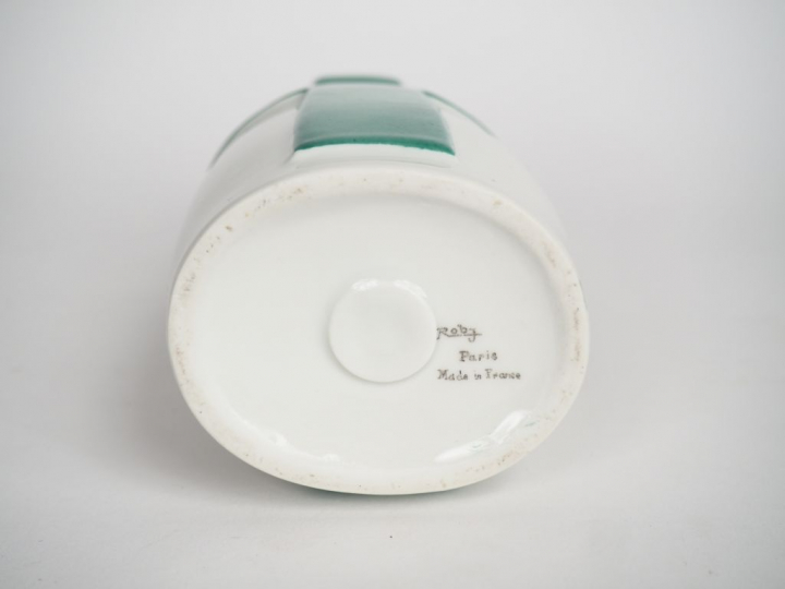 ROBJ.  Bouteille à liqueur en porcelaine polychrome "religieuse" Signé