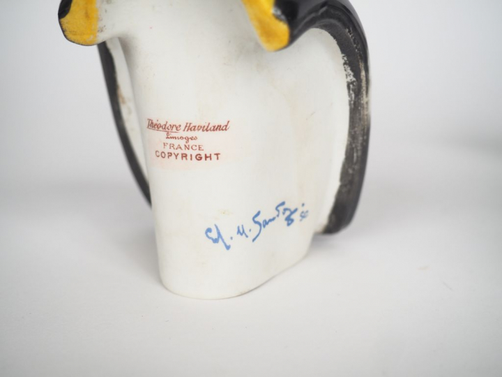 SANDOZ ET HAVILAND.  Pichet en porcelaine polychrome en forme de tête 