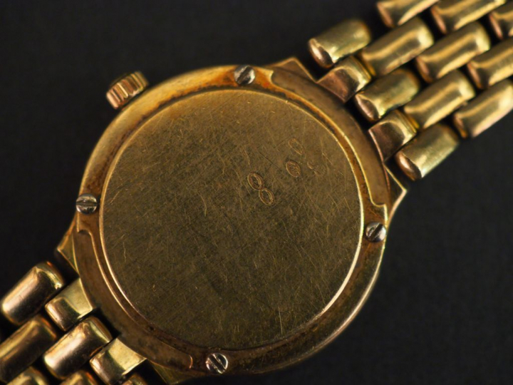 OMEGA Montre bracelet de dame, boitier et bracelet or jaune.  Cadran r