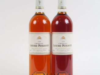Vente aux enchères 2 BOUTEILLES CHÂTEAU LAFAURIE PEYRAGUEY 1er CC SAUTERNES - 1999
