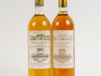 Vente aux enchères 2 BOUTEILLES CHÂTEAU FILHOT CC SAUTERNES - 1 de 1992 BG/1 de 1997