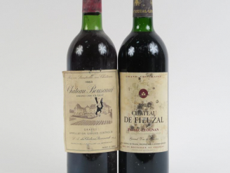 Vente aux enchères 2 BOUTEILLES CC GRAVES : 1 CHÂTEAU DE FIEUZAL 1988 BG/ET - 1 CHÂTEAU B