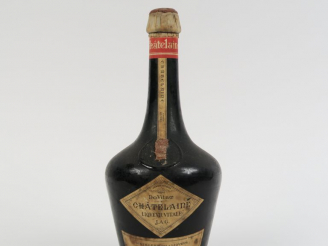 Vente aux enchères 1 VIEILLE BOUTEILLE LIQUEUR VITALE CHÂTELAINE