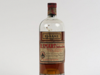 Vente aux enchères 1 VIEILLE BOUTEILLE LIQUEUR BANANE R. IMART - NIVEAU MOYEN