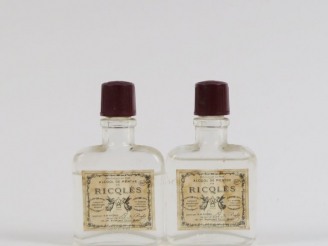Vente aux enchères 2 VIEUX FLACONS RICQLÈS