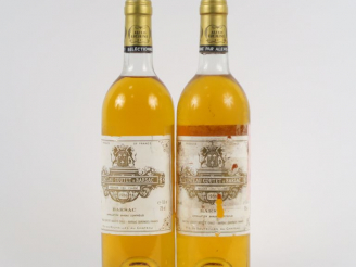 Vente aux enchères 2 BOUTEILLES CHÂTEAU COUTET 1er CC SAUTERNES - 1986 - LB/1 EA