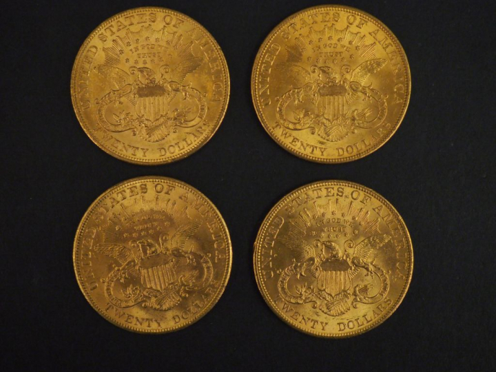 Quatre pièces de 20 Dollars or, 1904.  FRAIS ACHETEURS 5% TTC.