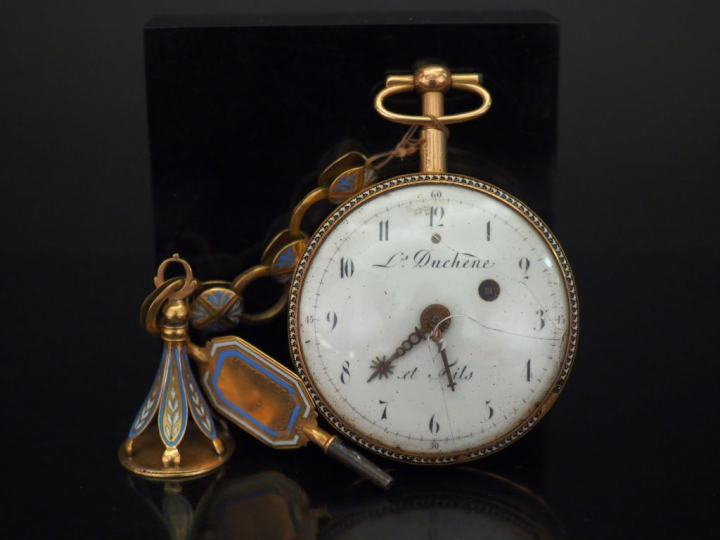 	Montre de gousset et sa châtelaine de style Louis XVI en or jaune et 