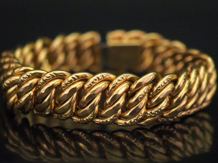 Bracelet articulé en or jaune, maille américaine.  Long. 19,5 cm  Poid