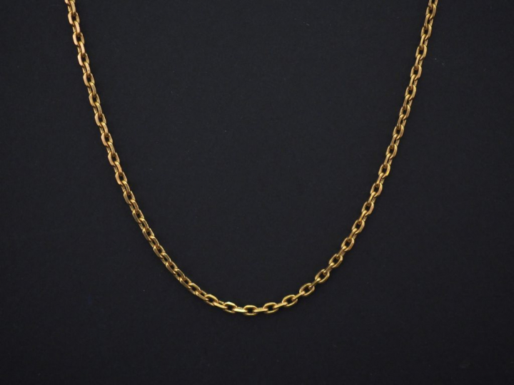 	Collier souple en or jaune, maille forçat. Long. 61 cm Poids. 12,97 g