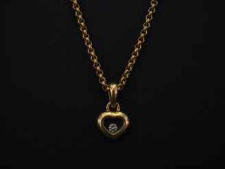 Vente aux enchères CHOPARD, Happy Diamond Chaine en or jaune, maille forçat et son penden