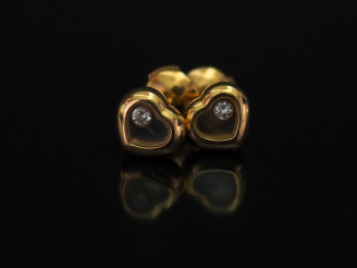 Vente aux enchères 	CHOPARD, Happy Diamond Paire de perces oreilles en or jaune en forme 