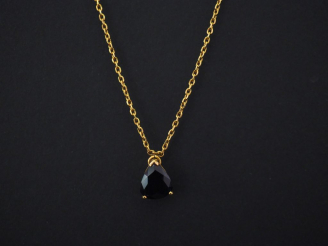 Vente aux enchères Chaine en or jaune, maille forçat, et son pendentif en or jaune serti 