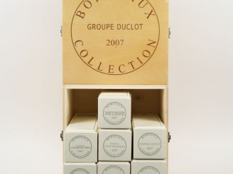 Vente aux enchères 1 CAISSE DUCLOT 2007 (VIDE) CONTENANT 7 COFFRETS