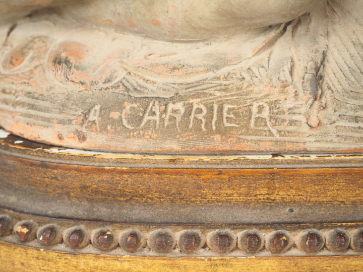 A CARRIER.   "La source" Groupe en terre cuite à patine claire. Signé 