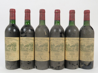 Vente aux enchères 6 BOUTEILLES CHÂTEAU CARBONNIEUX GCC GRAVES - 1985 - 5 LB/1 LB/ES