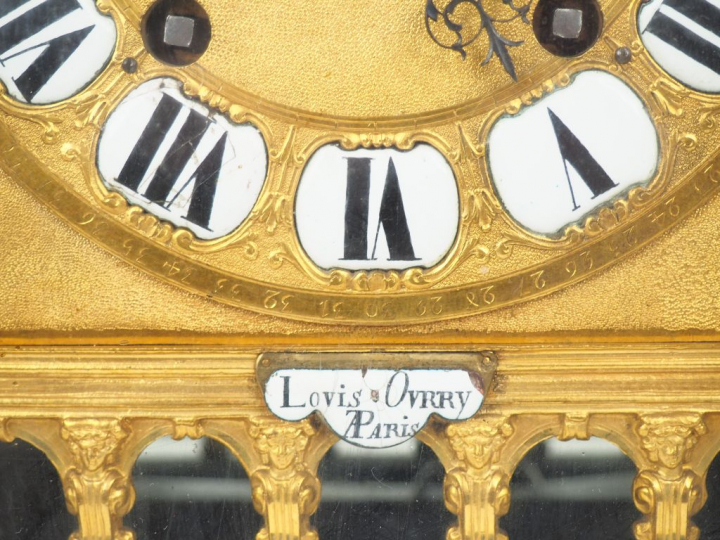 Cartel de style Louis XIV en marqueterie Boulle, cadran en métal gravé