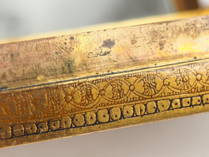 CARTIER.  Minaudière en vermeil et émaux polychromes à décor de style 