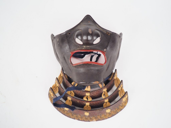 Japon, XVIIIe siècle,  Masque MEMPÔ de type ressei, en fer laqué brun 