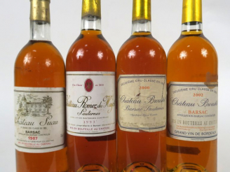 Vente aux enchères 4 BOUTEILLES : 1 CHÂTEAU SUAU BARSAC 1987 BG/ELS - 1 CHÂTEAU ROMER DU 