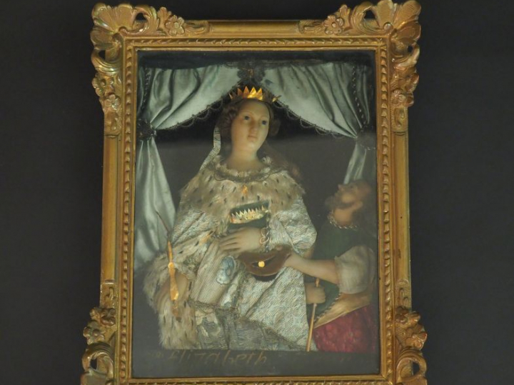 Petit tableau en cire et textile XIXème "Elisabeth et le mendiant". Di